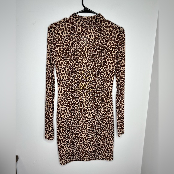 HYFVE Dresses & Skirts - NWT - Hyfve sheer leopard mock neck mini dress. Long sleeves. Size medium.